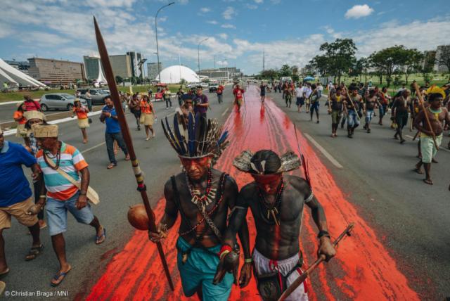Protest with a “trail of blood” in Brasilia, 2019.